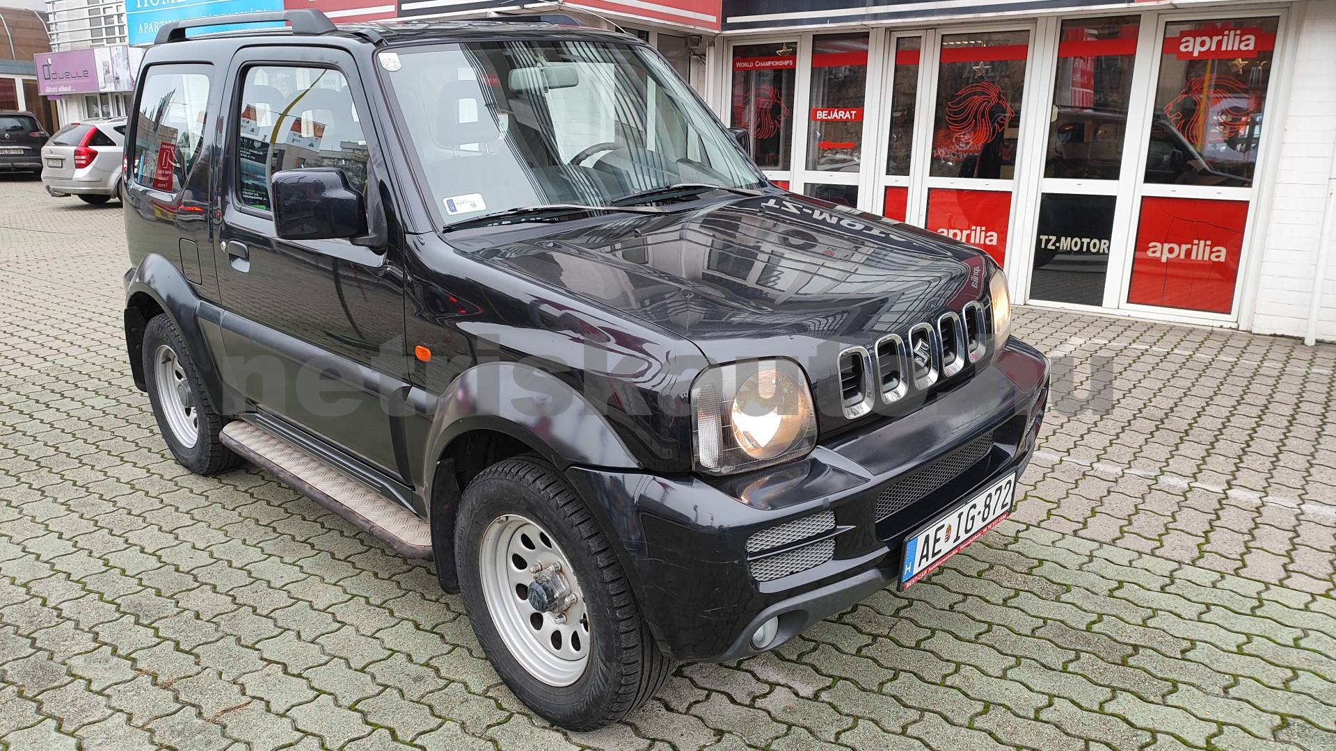 SUZUKI Jimny 1.3 4WD AC CD 15''AW személygépkocsi - 1328cm3 Benzin 121353 1/12